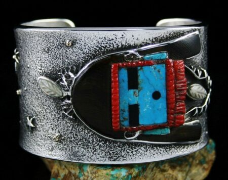 Philander Begay Yeibechai Kachina Inlay Tufa Cast Bracelet